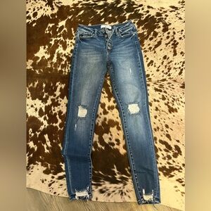 Kan can ripped jeans